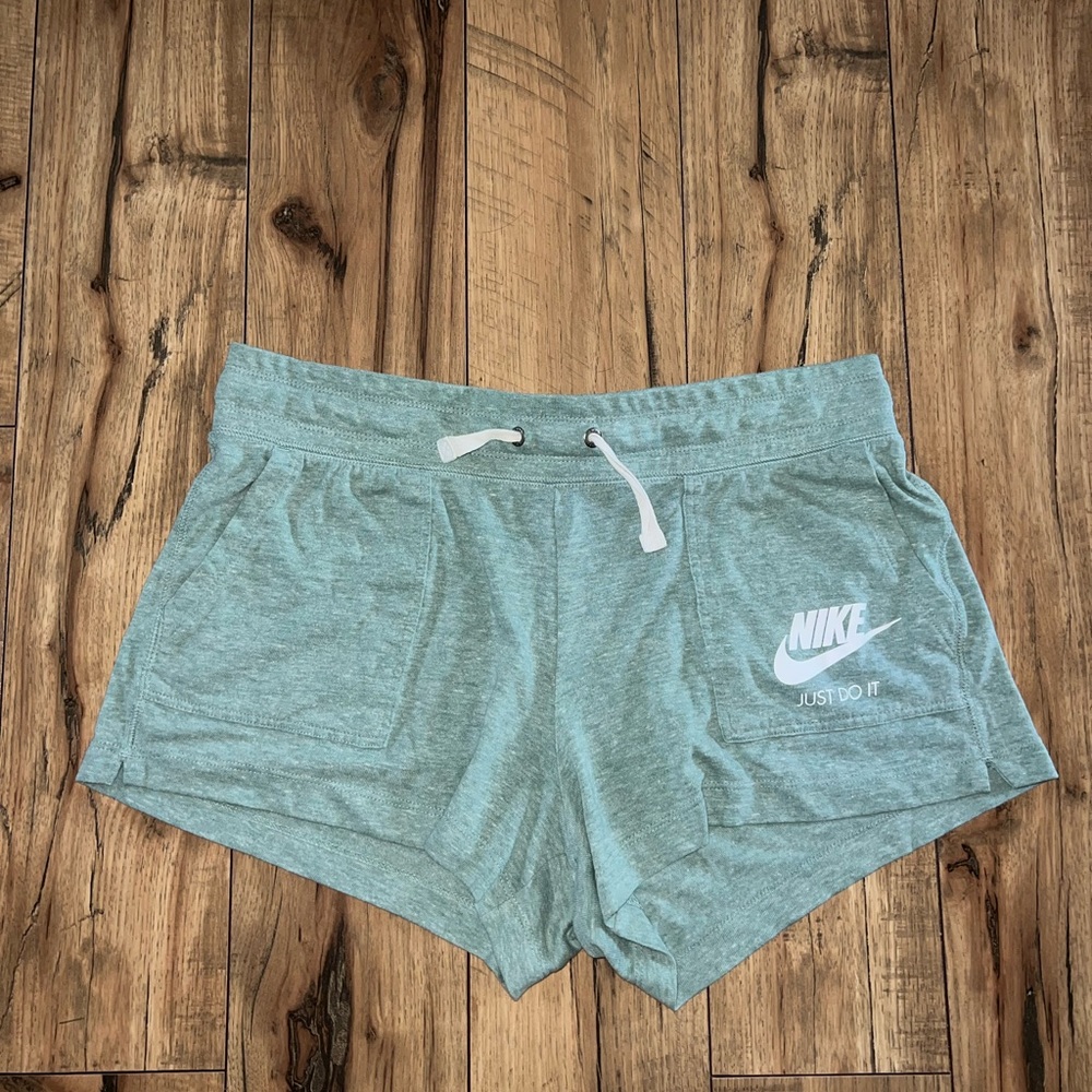 Nike Light Teal Athletic Shorts with White Logo - Picture 1 of 5